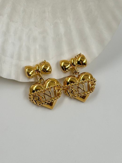 Клипсы с подвесками в виде сердец Nina Ricci