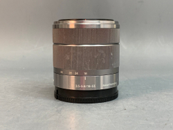 Sony 18-55mm 3.5-5.6 E OSS царапины на передней линзе