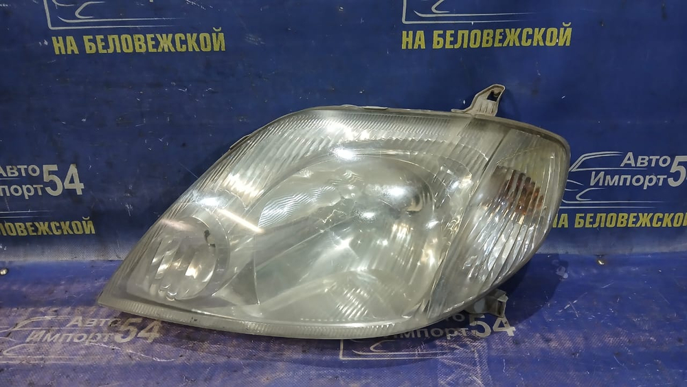 Фара передняя левая TOYOTA FIELDER 2000