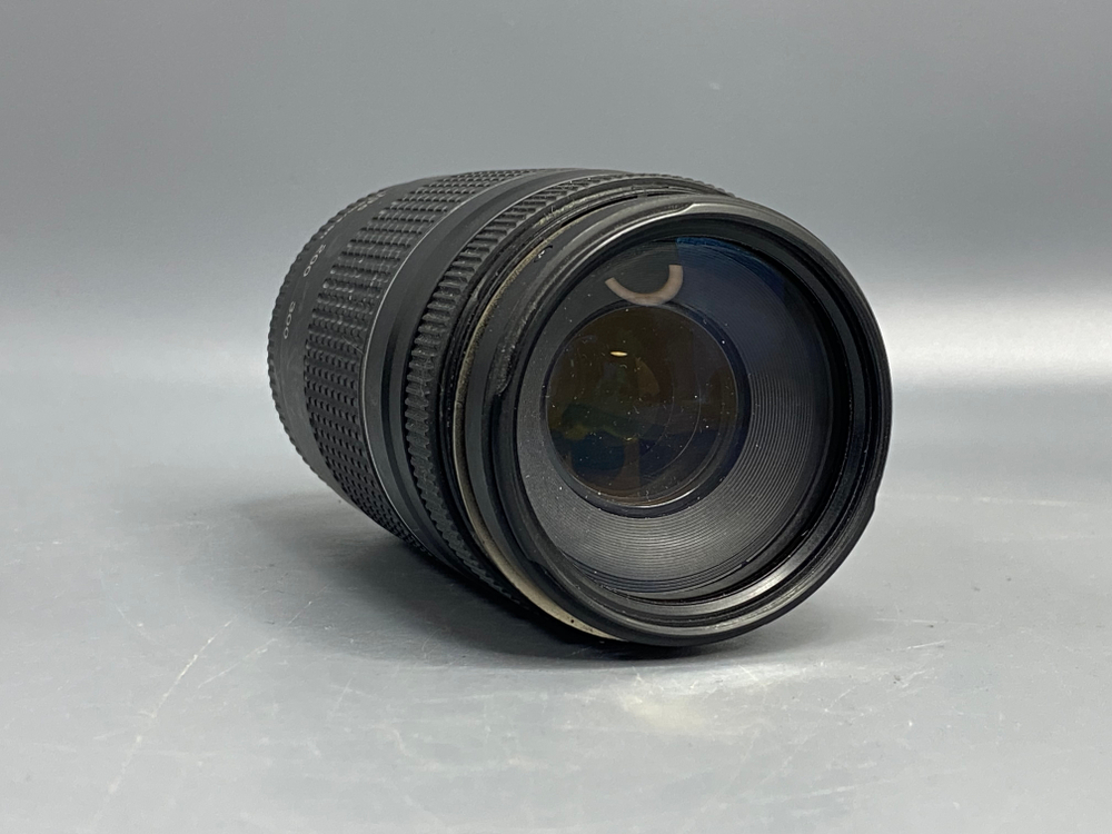 Canon EF 75-300mm f/4-5.6 III пыль внутри передней линзы