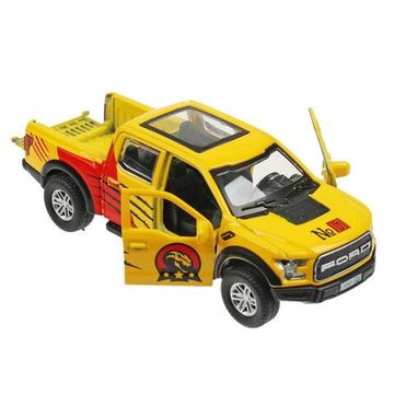 Машина металл FORD F150 RAPTOR ДИНОЗАВРЫ 12 см, двер, баг, ин, желтый, кор. Технопарк