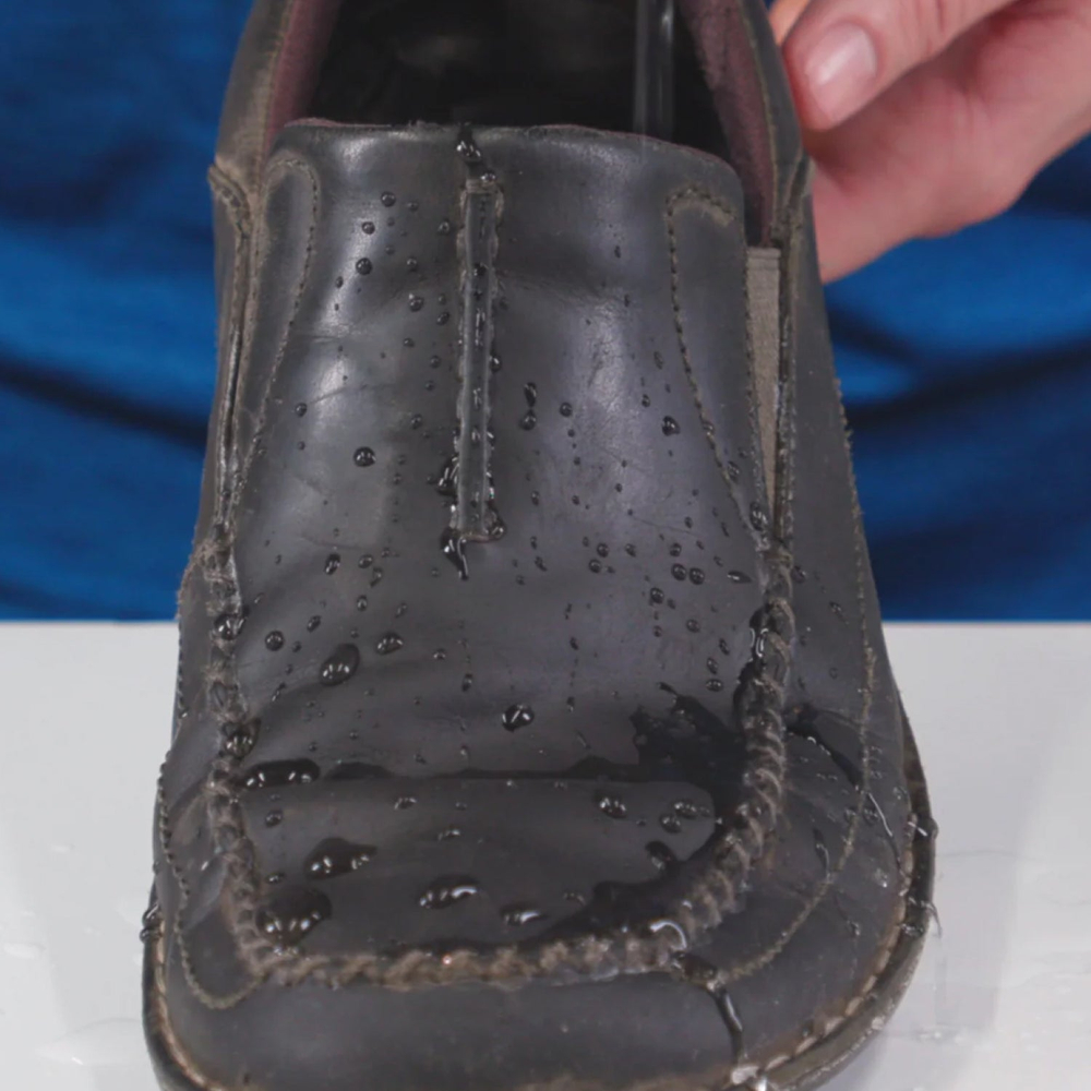 Водоотталкивающая пропитка для кожаной обуви сменный Gear Aid Revivex® Leather Water Repellent 120ml