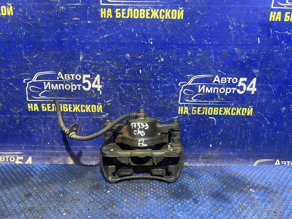 Суппорт тормозной передний левый Honda ACCORD 1997-2003
