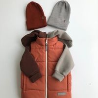 Жилет стеганый с капюшоном "Терракот"