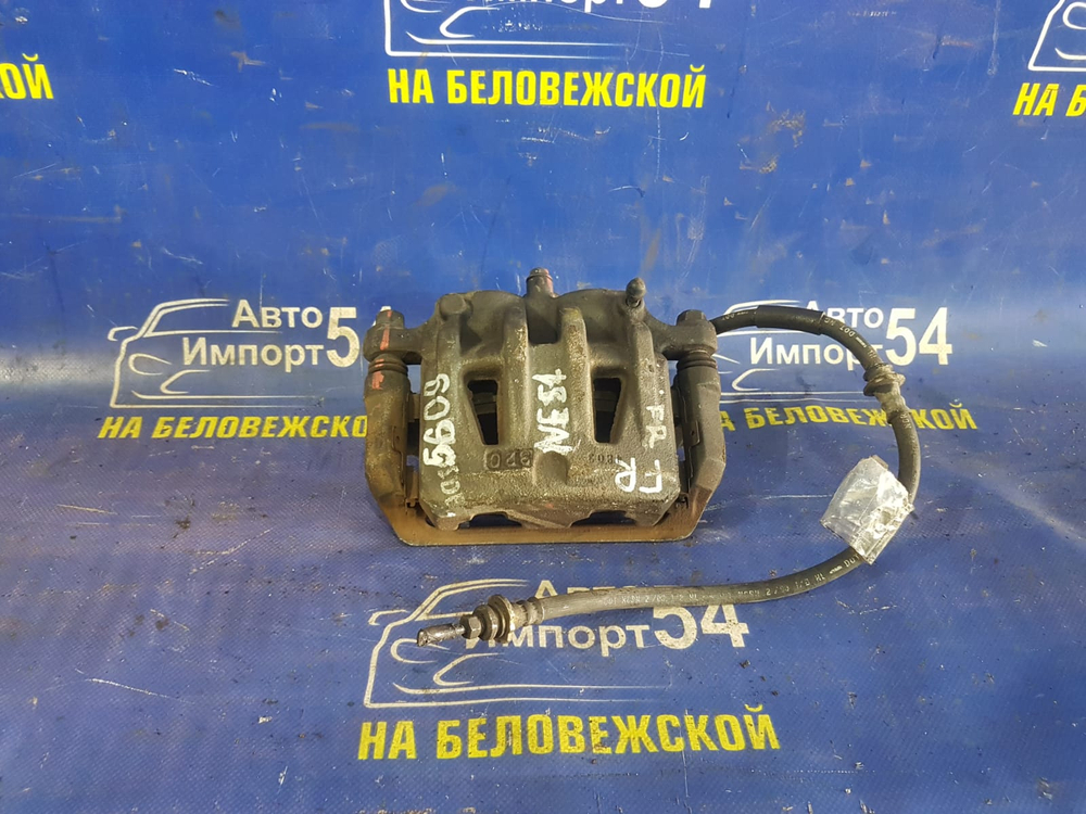 Суппорт тормозной передний правый NISSAN ELGRAND 2002-2010