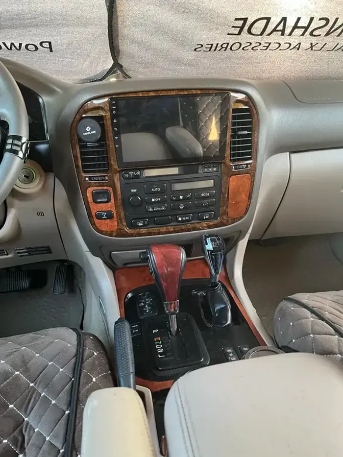 Магнитола для Toyota Land Cruiser 100, Lexus LX470 1998-2002 (кондиционер или климат внизу, рамка дерево) - Teyes CC3L монитор 9" IPS на Android 10, CarPlay, 4G SIM-слот