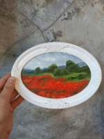 Картина в овальной рамке