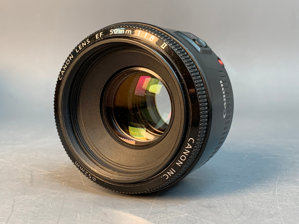 Canon 50mm 1.8 II пыль внутри линз