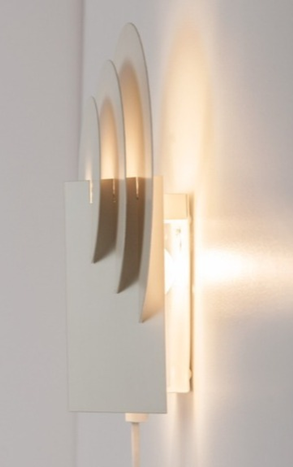Круглый настенный светильник от Bent Karlby для Lyskaer