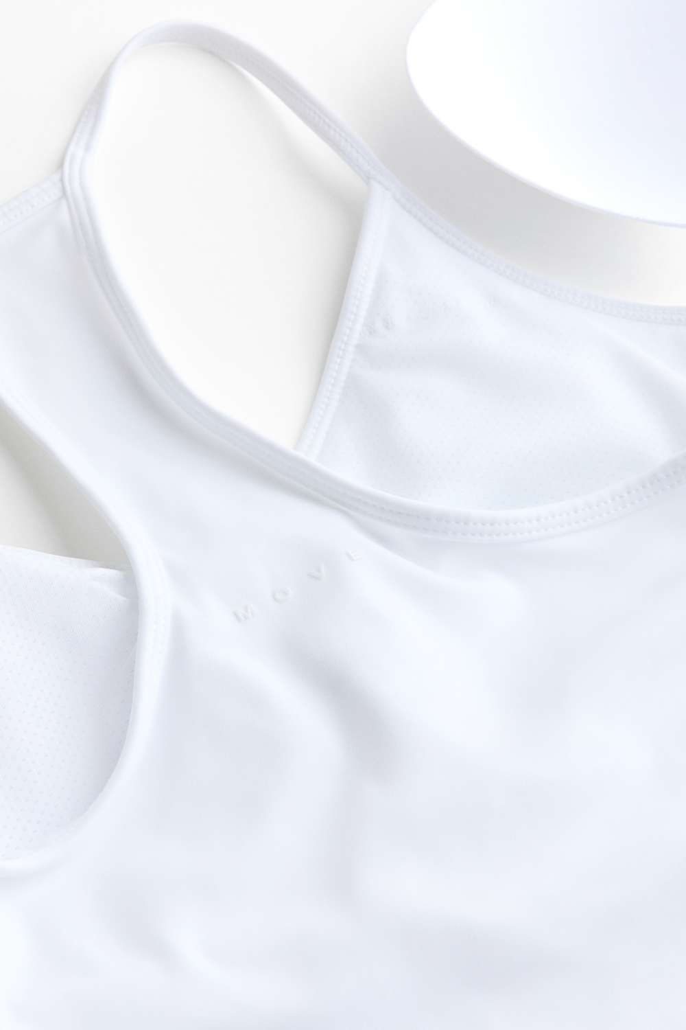 Спортивный топ без рукавов со встроенным бюстгальтером SculptMove™ - H&M