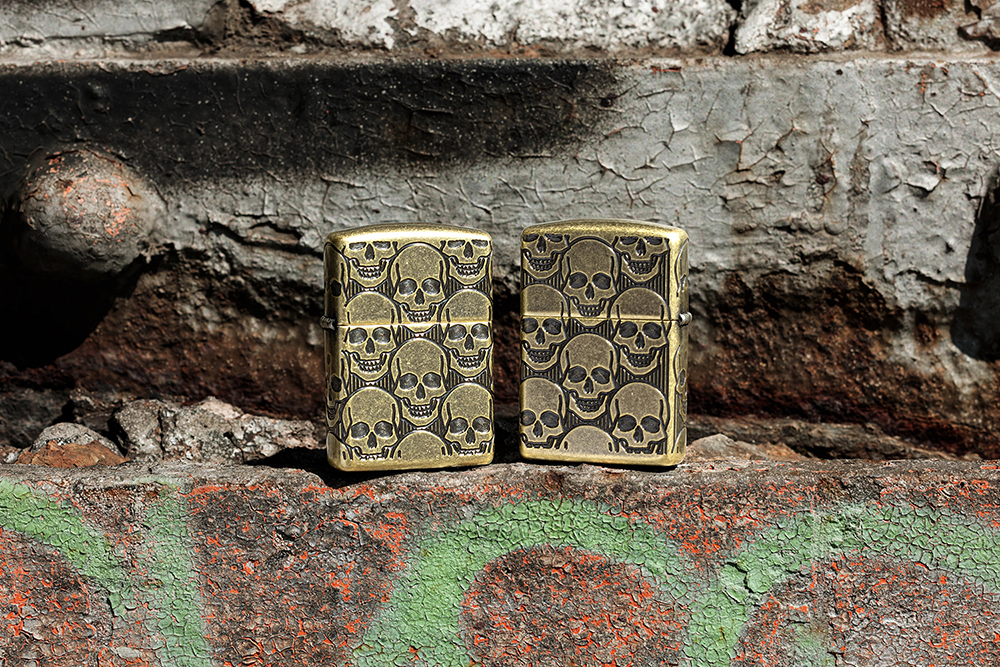 Зажигалка ZIPPO Armor Ухмыляющиеся черепушки с покрытием античная латунь | Cackling Cranium Antique
