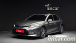 Toyota Camry 2.5 XLE Hybrid — 2024