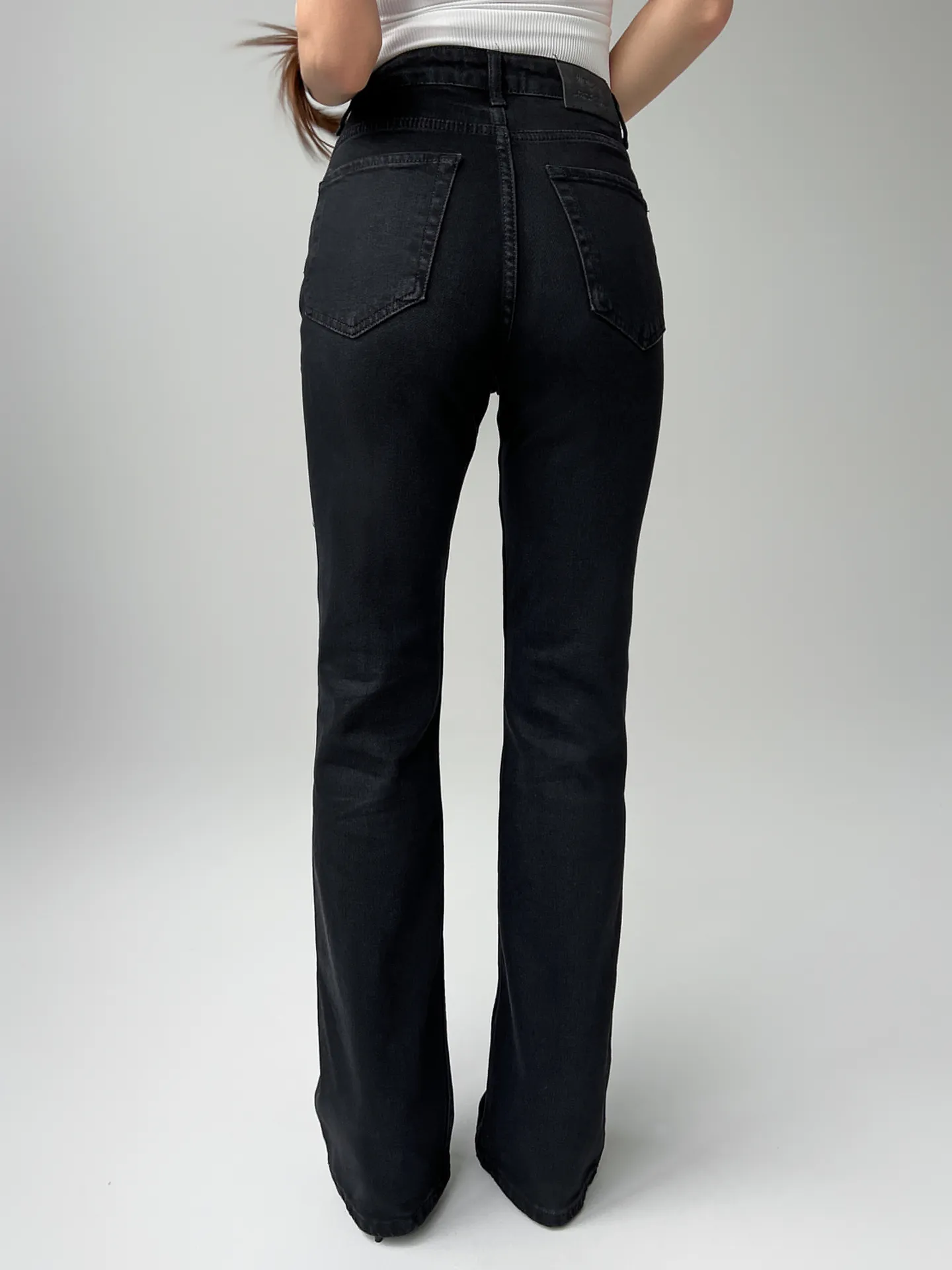 Джинсы Woman Denim 700 клеш со стрейчем однотонные