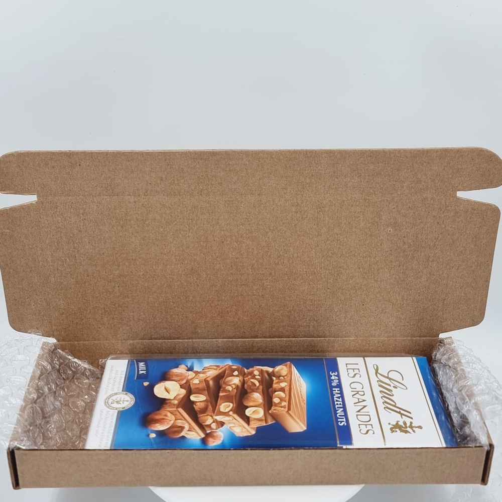 Lindt молочный шоколад Les Grandes Hazelnut с фундуком 34%, 150 г (Швейцария)