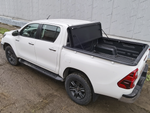 Крышка HAL 4-х секционная STANDART HILUX 2015+ Араб. версия, штат. защ. стекла, вкладышь
