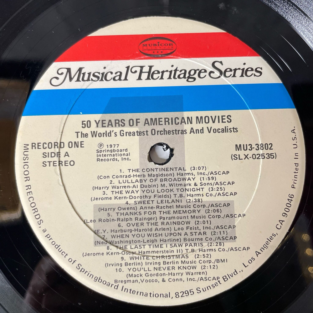 Винтажная виниловая пластинка LP Сборник Музыка Из Американских Фильмов 50 Years Of American Movies (USA 1977) (Star Wars, Gonna Fly Now, Moon River)