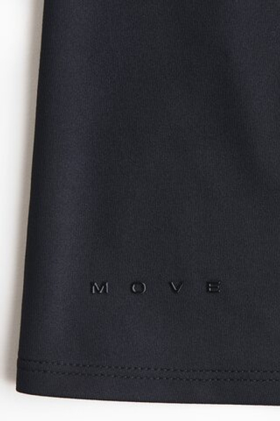 Спортивный топ DryMove™ — длинные рукава, приталенный крой - H&M