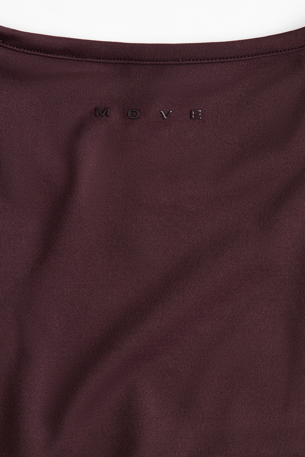 Бесшовный спортивный топ облегающего кроя SoftMove™ - H&M