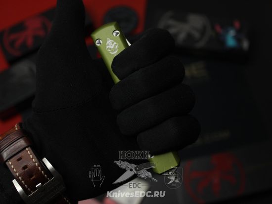 Фронтальный нож Microtech Ultratech Hellhound Green 119-10ODS с клинком из стали Böhler M390