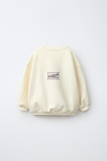 ZARA ТОЛСТОВКА С ВЫШИВКОЙ И ПРИНТОМ «МЕДВЕДЬ», ЭКРЮ