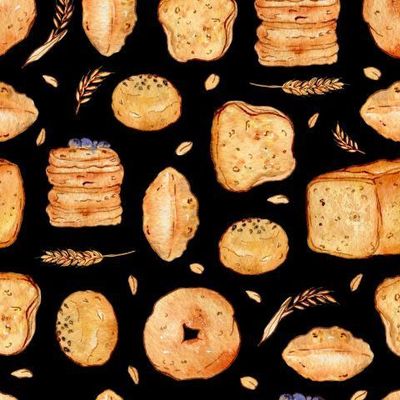 Пшеничный хлеб и булочки. Бейгл и панкейки на черном