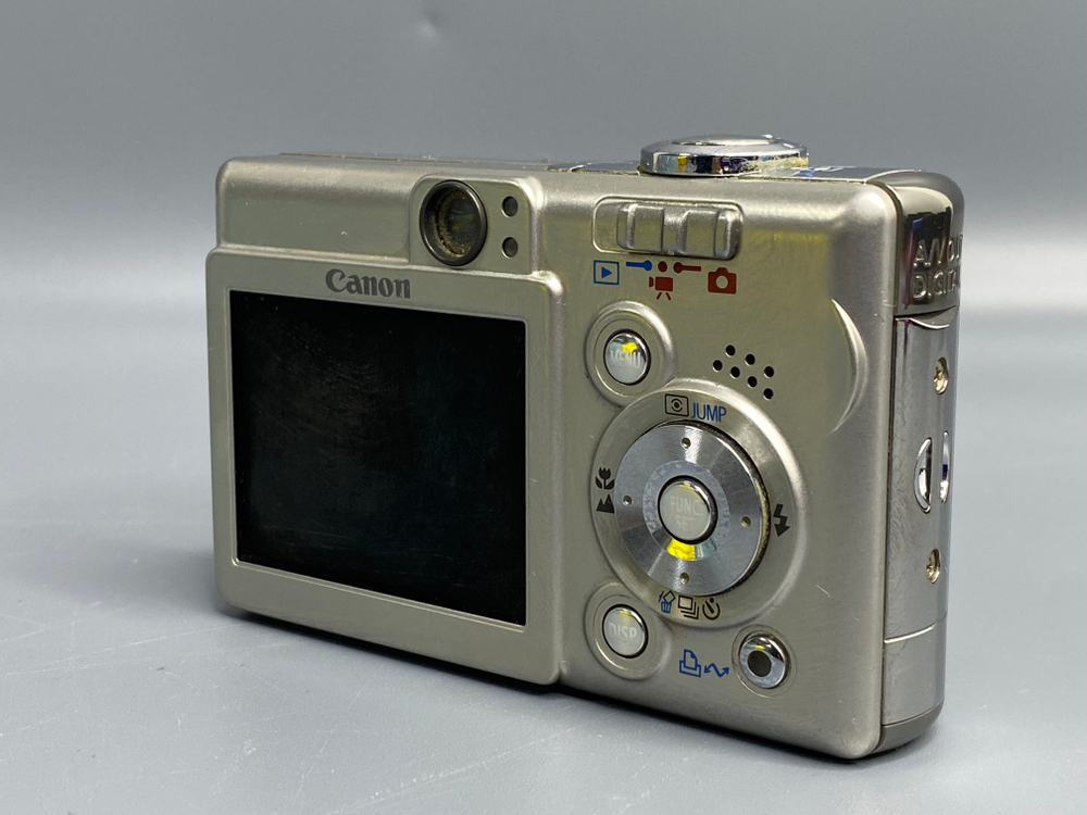 Canon IXUS 50 — не работает отдаление