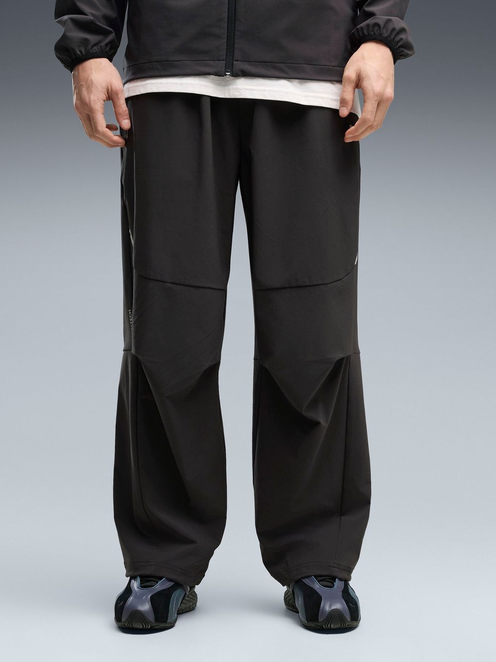 Брюки спортивные мужские PUMA PUMATECH 4-Way Stretch Oversized Woven Track Pants op