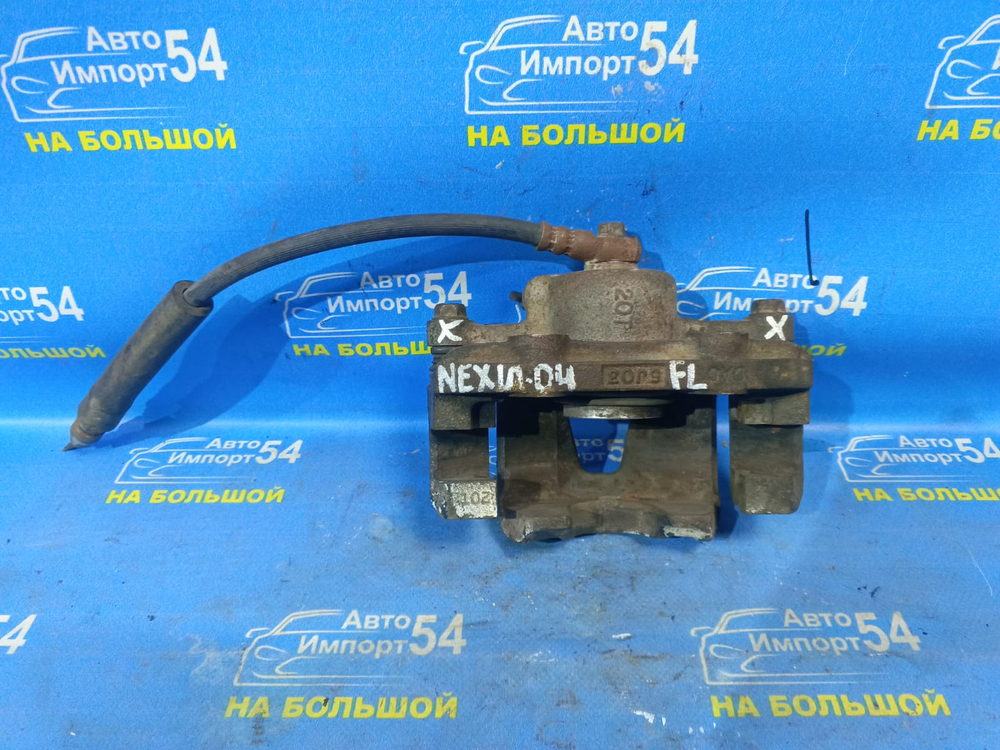Суппорт тормозной передний левый DAEWOO NEXIA 2001
