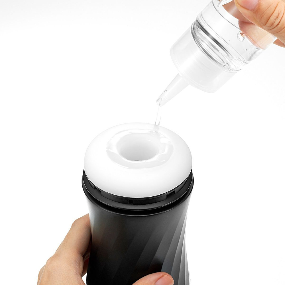 Мастурбатор с регулируемой плотностью обхвата Custom Strength CUP Twist Ripple (Цвет: черный с синим)