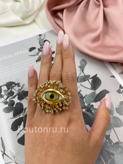 Кольцо Скиап. крупное золотистое в форме глаза со стразами