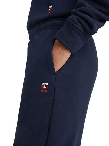 Женские теннисные брюки Tommy Hilfiger Relaxed Global Stripe Pant - Бирюзовый