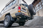 Бампер силовой задний Toyota Land Cruiser 78 2007+ с квадратом под фаркоп, калиткой и фонарями РИФ