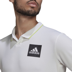 Мужское теннисное поло Adidas Paris Heat.Rdy Tennis Freelift Polo M - white/pulse lime