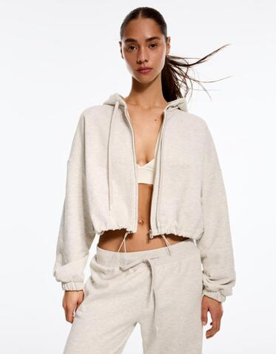 Свитшот с капюшоном, застежкой-молнией и вырезом - BERSHKA