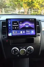 Магнитола для Nissan Tiida C11 2004-2013 (климат с круглым экранчиком, рамка черная) - FarCar S500-TS20 монитор 9.5" 2K QLED на Android 14, Быстрейшая, CarPlay, 4G SIM-слот