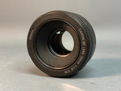 Canon 50mm 1.8 STM немного шумит при AF