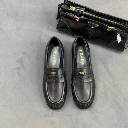Лоферы Prada