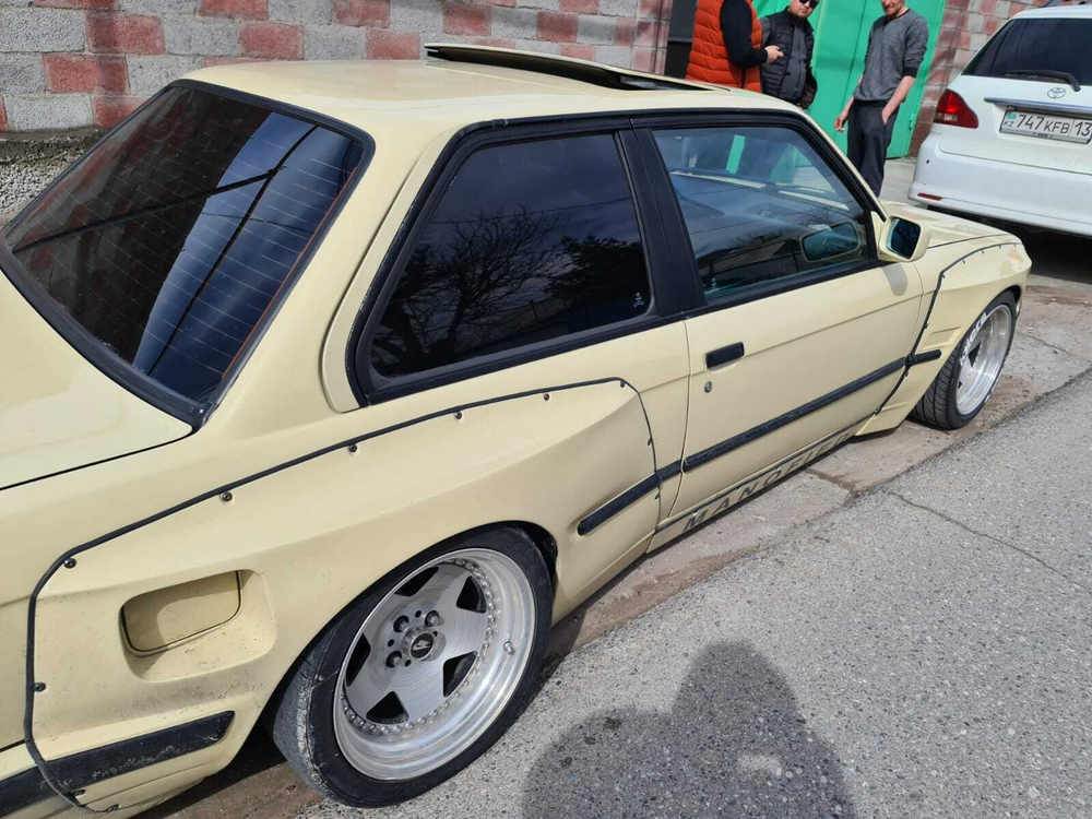 BMW E30 PANDEM (ROCKET BUNNY) Задняя левая накладка (Реплика "Стекловолокно")