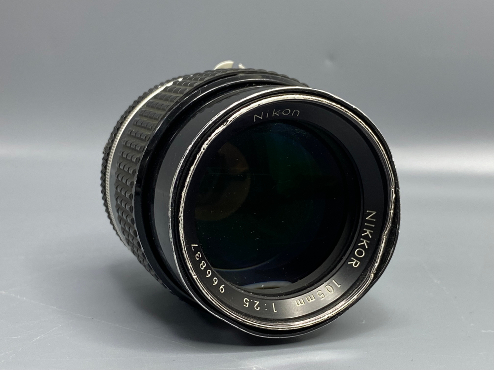 Nikon Nikkor 105mm f/2.5 Ai-S пыль внутри оптики