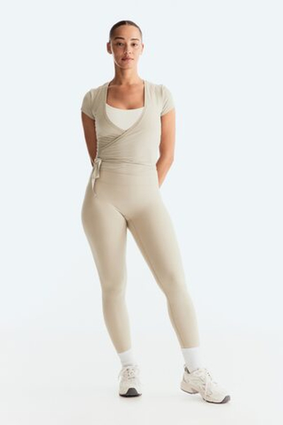Спортивный топ из модала с запахом — короткие рукава - H&M