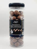 Лакрица в молочном шоколаде Delux, покрытая карамельным порошком и морской солью, 300 г (Германия)