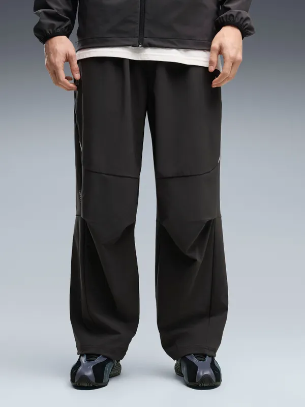 Брюки спортивные мужские PUMA PUMATECH 4-Way Stretch Oversized Woven Track Pants op