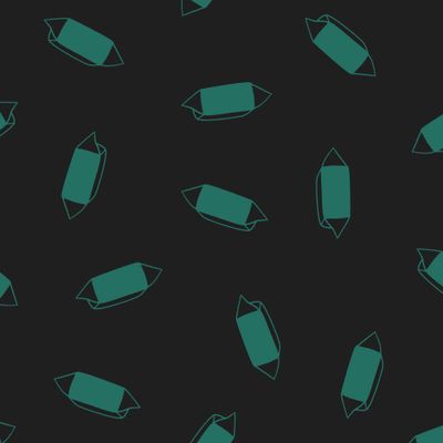 Шоколадные конфеты на темно-зеленом фоне