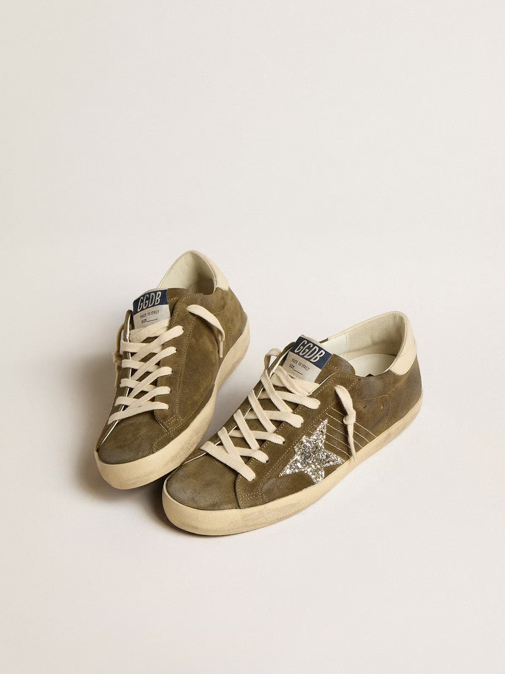 Super Star in green suede with glitter star and cream heel tab