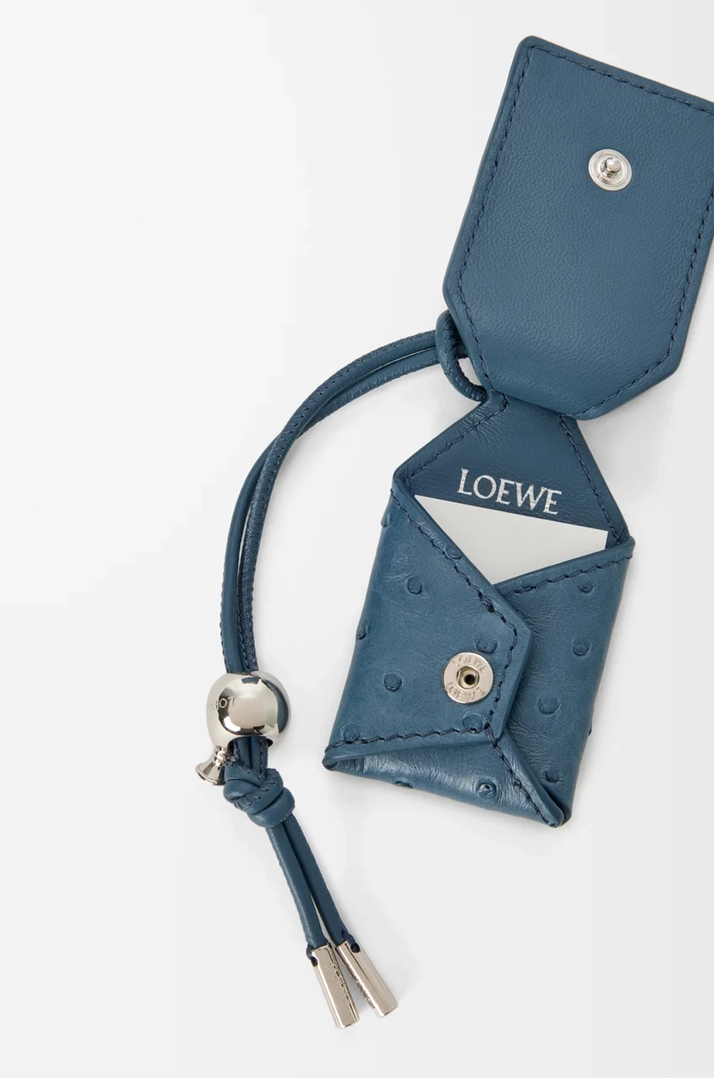 Loewe Маленькая сумка Puzzle Featherlight из страусиной кожи, синий