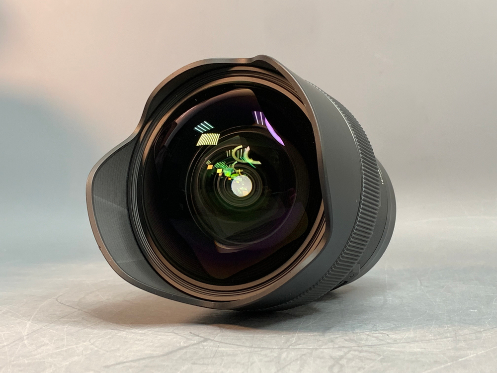 Sigma AF 14mm 1.8 DG HSM Art Canon едва заметная царапка