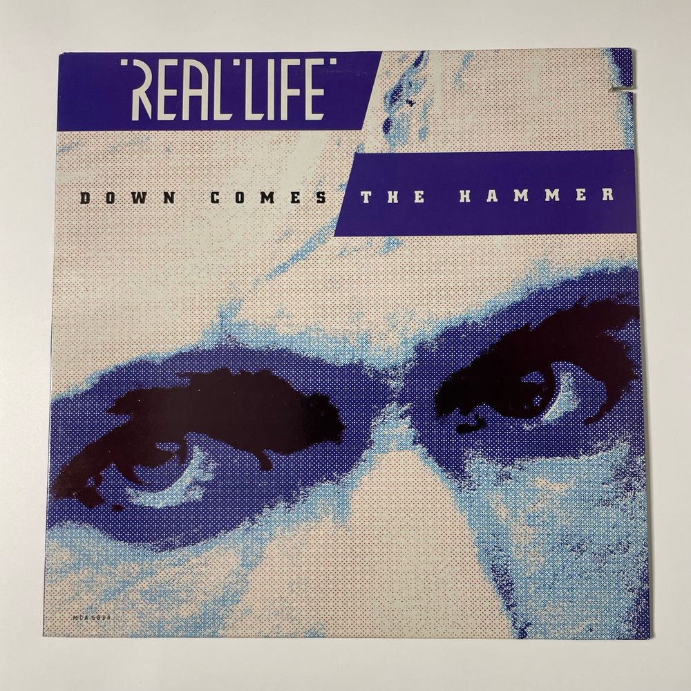 Винтажная виниловая пластинка LP Real Life Down Comes The Hammer (Канада 1986)