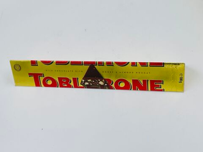 Toblerone Gold шоколад молочный с медом и нугой 100 г, Швейцария