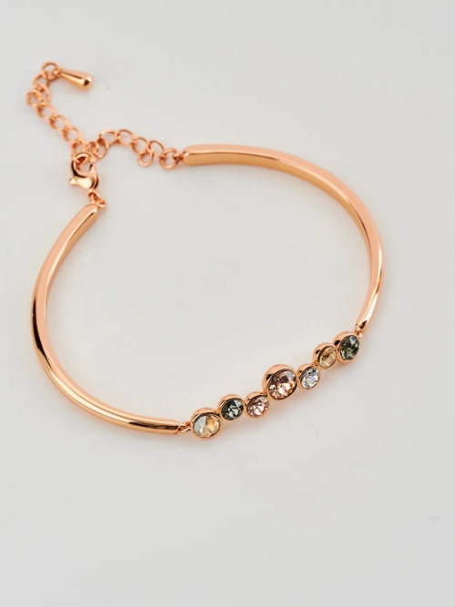 Жесткий браслет Эльза с камнями Swarovski шампань