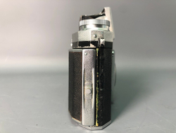 Praktica + Biometar 5,8cm 1:2, зеркало исцарапано, присутствуют пузырьки воздуха.